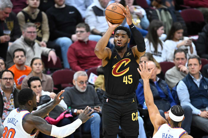 Oct 31, 2023; Cleveland, Ohio, USA; Cleveland Cavaliers guard Donovan Mitchell (45) shoots in the third quarter against the New York Knicks at Rocket Mortgage FieldHouse.